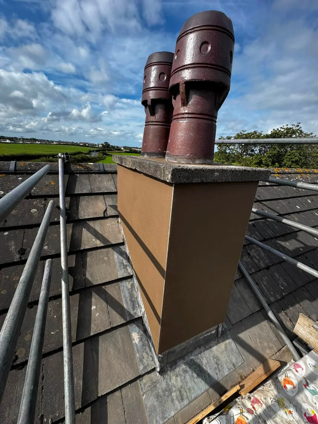 Chimney stack with a rendered finish