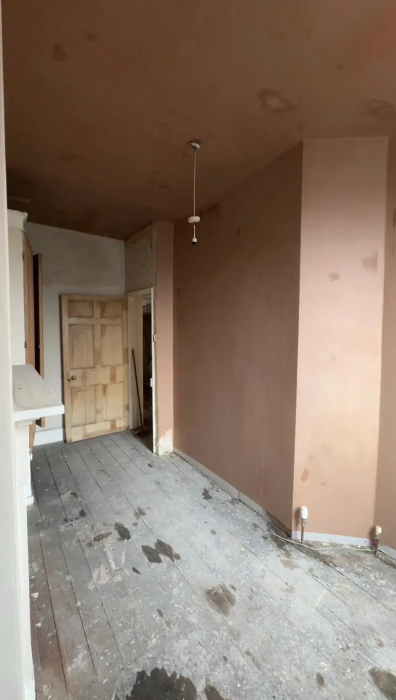 Room with newly plastered walls and ceiling