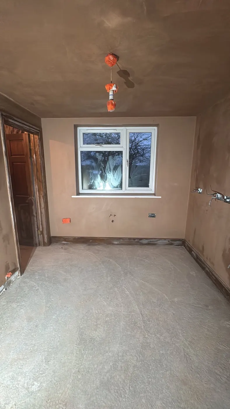 Skimming Carlisle – Room with freshly plastered walls and ceiling drying around a window